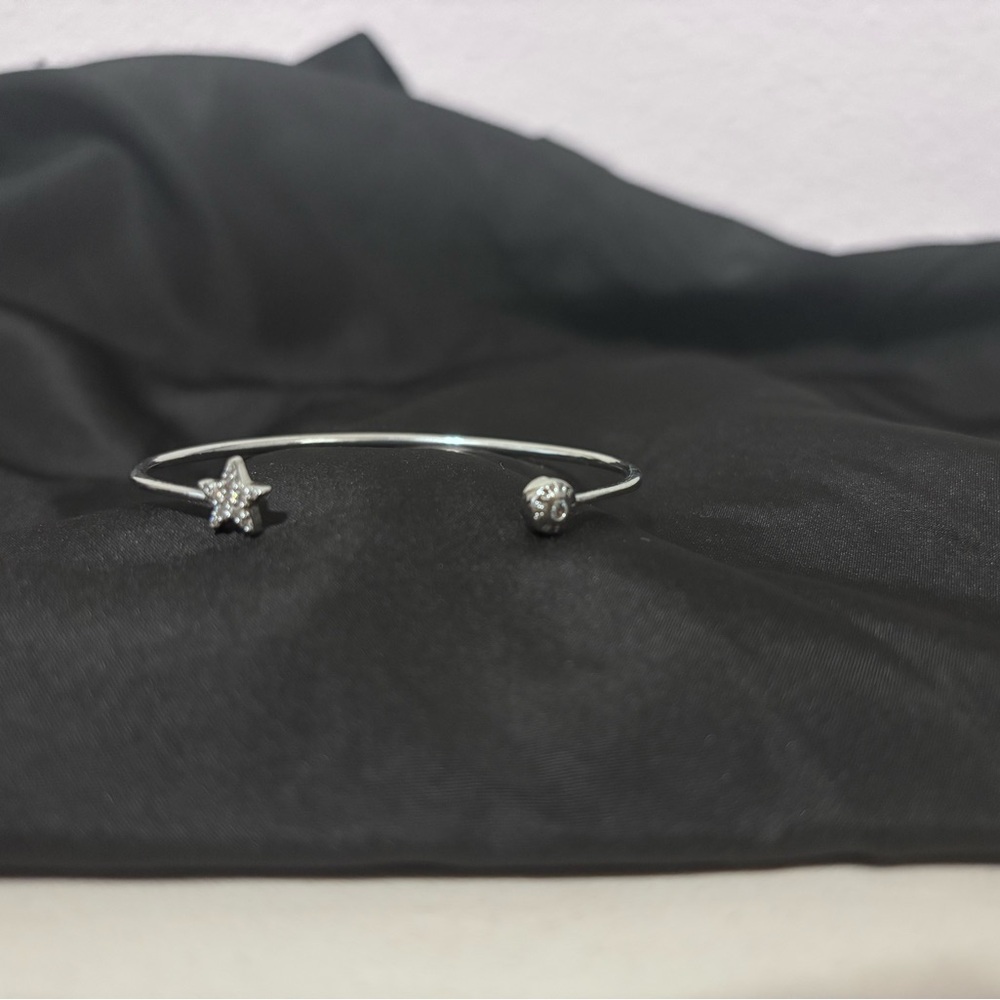 Henri Bendel Silver Star Bangle Bracelet
